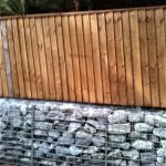 fence with rock wall